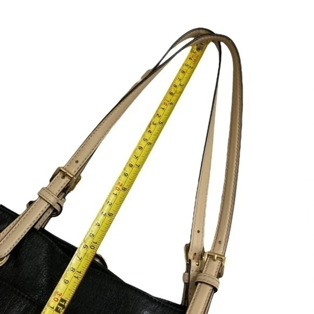 Michael Kors soft black leather tote bag with gold logo hangtag